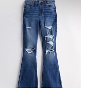 Classic Blue Flare Jeans with Distressed Details